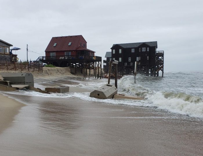 house collapses into ocean