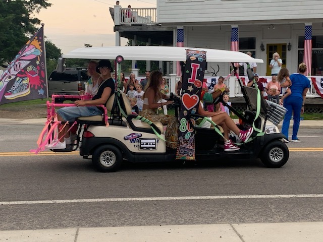 Golf carts decked out for a parade, News