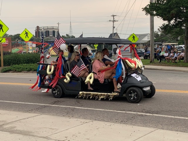 Golf carts decked out for a parade, News