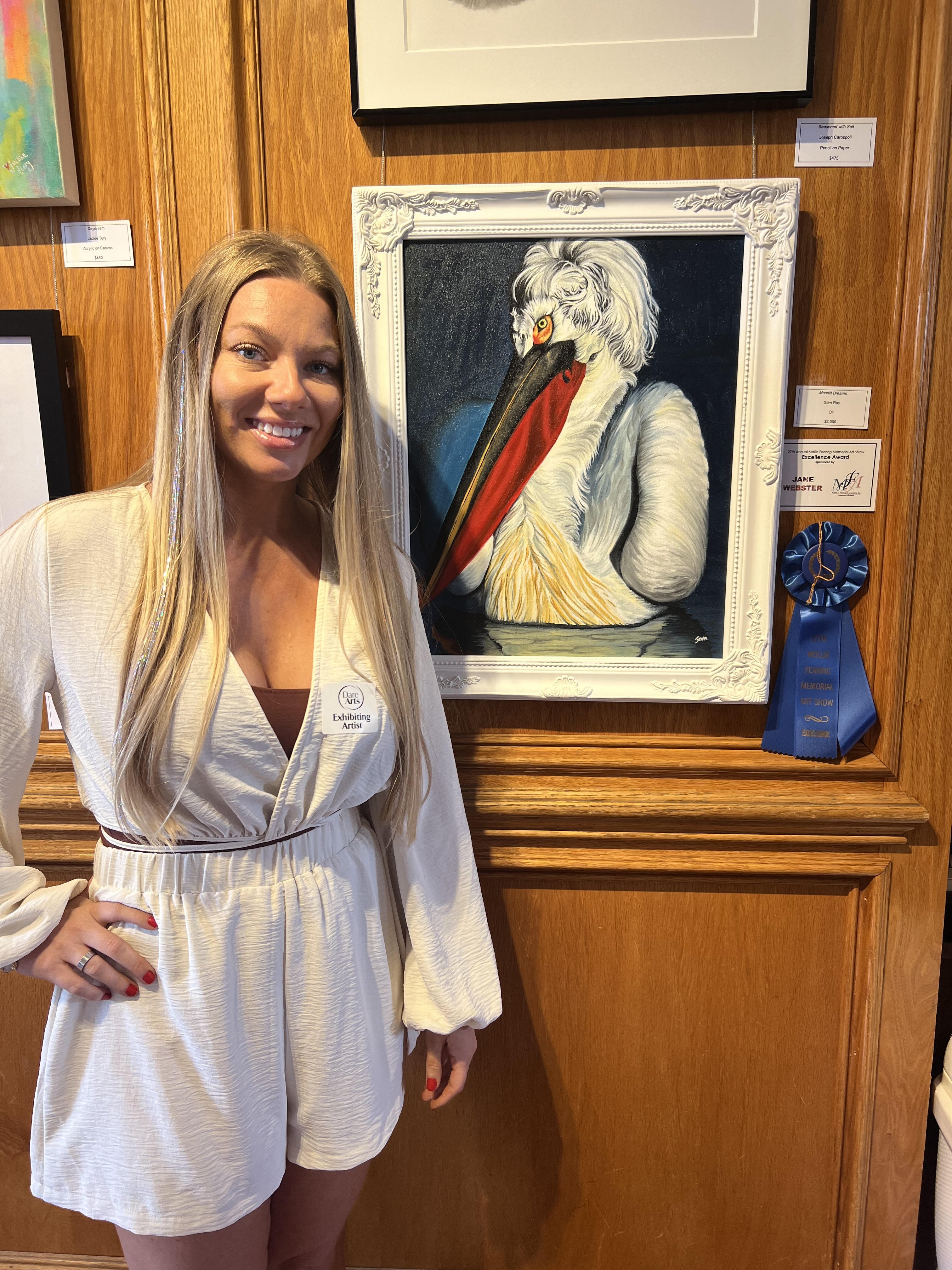Excellence Award recipient Sam Ray with her piece “Moonlit Dreams” (oil). Photo courtesy of Dare Arts.