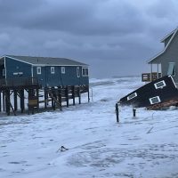 Photo showing portion of collapsed house at 23241 Surf Side Drive, Rodanthe