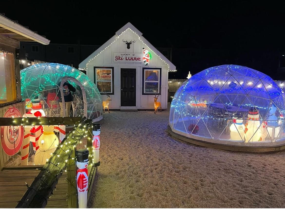 The backyard at Jingle 12 Tavern featuring igloos and a ski lodge that can be reserved. Photo courtesy of Jingle 12 Tavern.